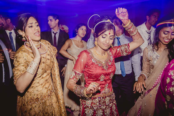 Indian wedding reception celebration and dancing Indian wedding reception celebration and dancing