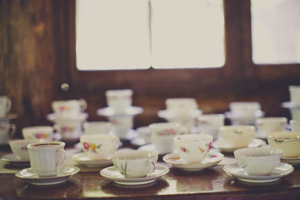 romantic camp wedding eclectic china, photo by Terra Lange Photography | via junebugweddings.com wedding reception with mismatched china