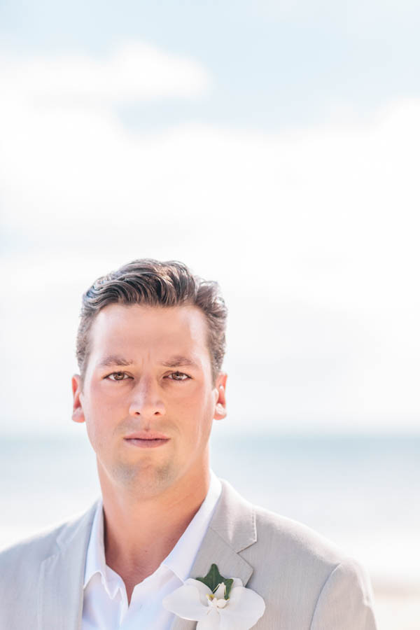 intimate beach wedding groom's portrait, photo by Chris Glenn | via junebugweddings.com intimate beach wedding groom's portrait, photo by Chris Glenn | via junebugweddings.com