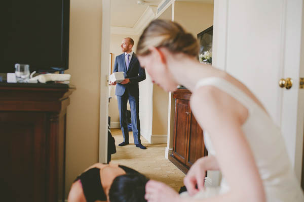 bride and groom getting ready together bride and groom getting ready together