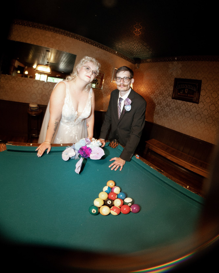 unique wedding photo at a pool table