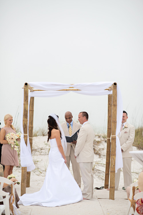 Clearwater, Florida beach wedding with a white, sand and pink wedding color palette, photo by Kristen Weaver | junebugweddings.com Clearwater, Florida beach wedding with a white, sand and pink wedding color palette, photo by Kristen Weaver | junebugweddings.com