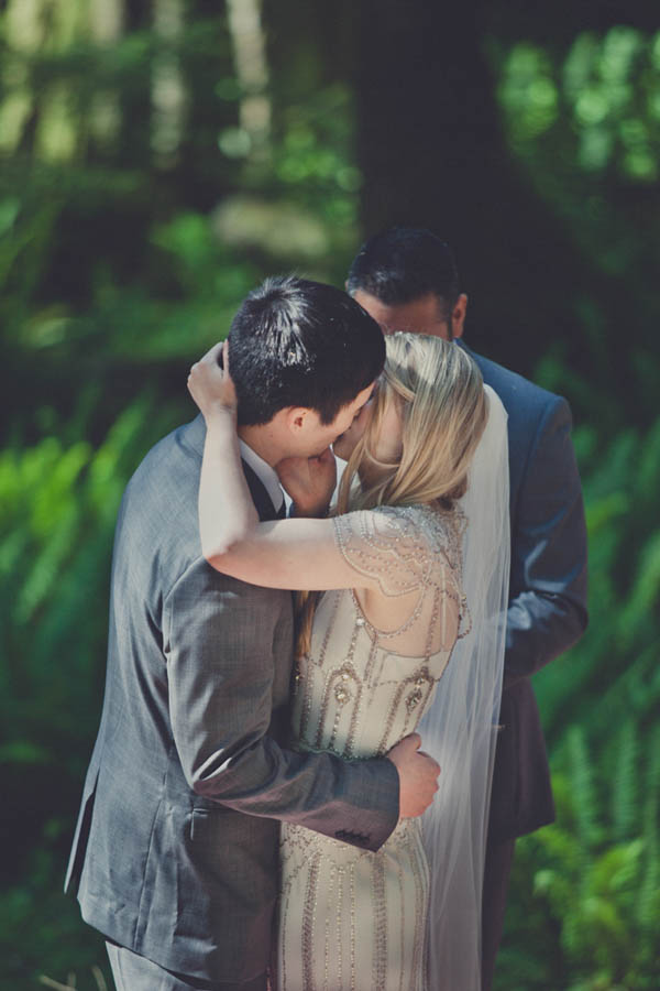 romantic camp wedding ceremony, photo by Terra Lange Photography | via junebugweddings.com wedding ceremony kiss