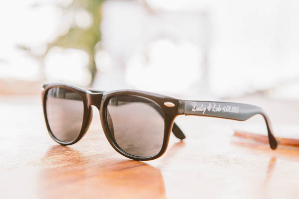 intimate beach wedding sunglasses favors, photo by Chris Glenn | via junebugweddings.com intimate beach wedding sunglasses favors, photo by Chris Glenn | via junebugweddings.com