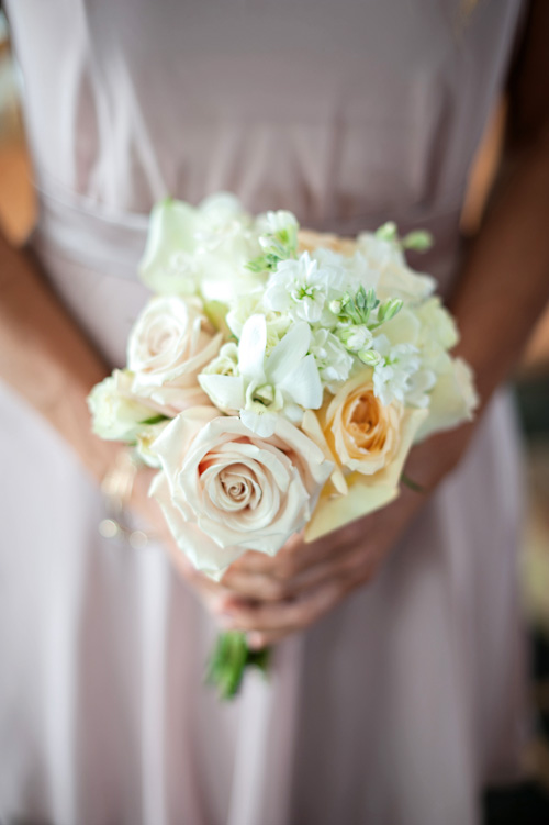 Clearwater, Florida beach wedding with a white, sand and pink wedding color palette, photo by Kristen Weaver | junebugweddings.com Clearwater, Florida beach wedding with a white, sand and pink wedding color palette, photo by Kristen Weaver | junebugweddings.com