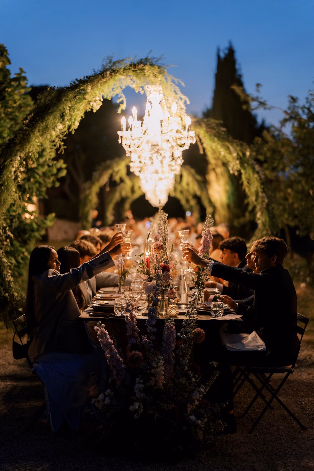 nighttime wedding reception dinner