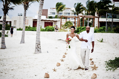 colorful tropical beach wedding at Excellence Playa Mujeres All-Inclusive Resort in Cancun, Mexico - photos by JAGstudios | via junebugweddings.com colorful tropical beach wedding at Excellence Playa Mujeres All-Inclusive Resort in Cancun, Mexico - photos by JAGstudios | via junebugweddings.com