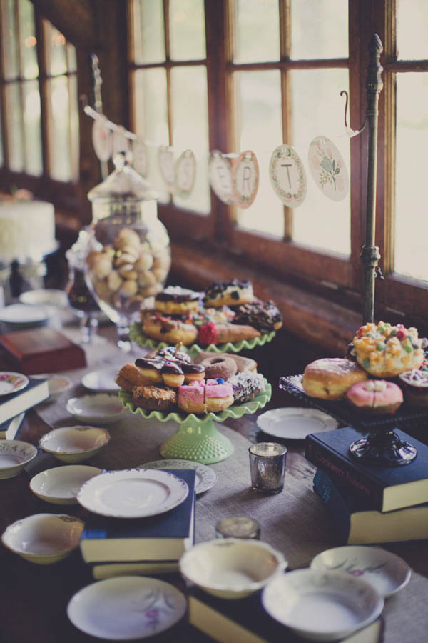 romantic camp wedding reception dessert table, photo by Terra Lange Photography | via junebugweddings.com wedding dessert table with donuts