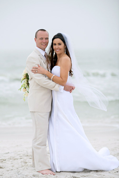 Clearwater, Florida beach wedding with a white, sand and pink wedding color palette, photo by Kristen Weaver | junebugweddings.com Clearwater, Florida beach wedding with a white, sand and pink wedding color palette, photo by Kristen Weaver | junebugweddings.com