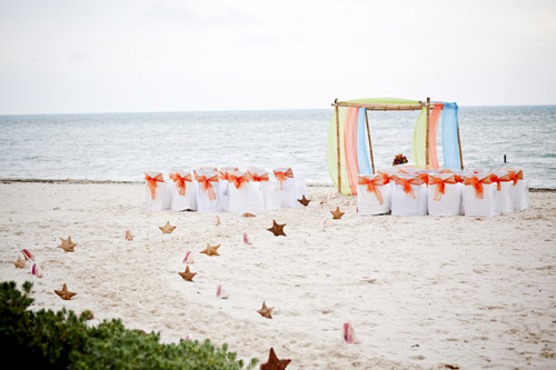 colorful tropical beach wedding at Excellence Playa Mujeres All-Inclusive Resort in Cancun, Mexico - photos by JAGstudios | via junebugweddings.com colorful tropical beach wedding at Excellence Playa Mujeres All-Inclusive Resort in Cancun, Mexico - photos by JAGstudios | via junebugweddings.com