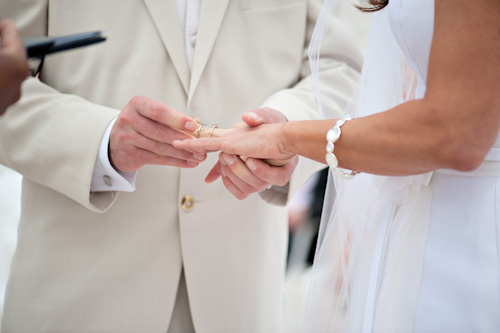 Clearwater, Florida beach wedding with a white, sand and pink wedding color palette, photo by Kristen Weaver | junebugweddings.com Clearwater, Florida beach wedding with a white, sand and pink wedding color palette, photo by Kristen Weaver | junebugweddings.com