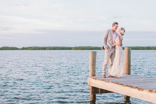 intimate beach wedding couple's portrait, photo by Chris Glenn | via junebugweddings.com intimate beach wedding couple's portrait, photo by Chris Glenn | via junebugweddings.com