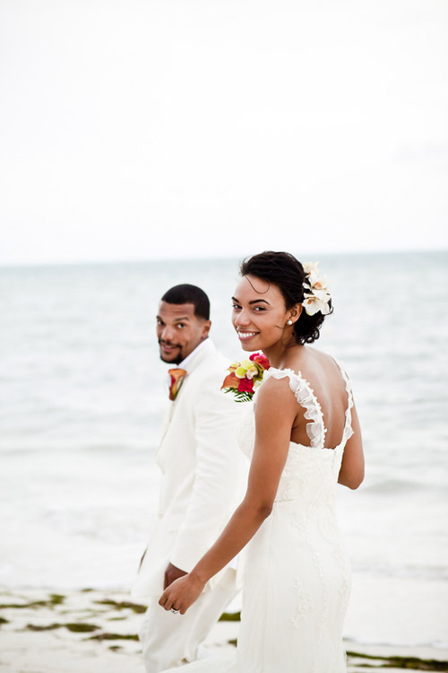 colorful tropical beach wedding at Excellence Playa Mujeres All-Inclusive Resort in Cancun, Mexico - photos by JAGstudios | via junebugweddings.com colorful tropical beach wedding at Excellence Playa Mujeres All-Inclusive Resort in Cancun, Mexico - photos by JAGstudios | via junebugweddings.com