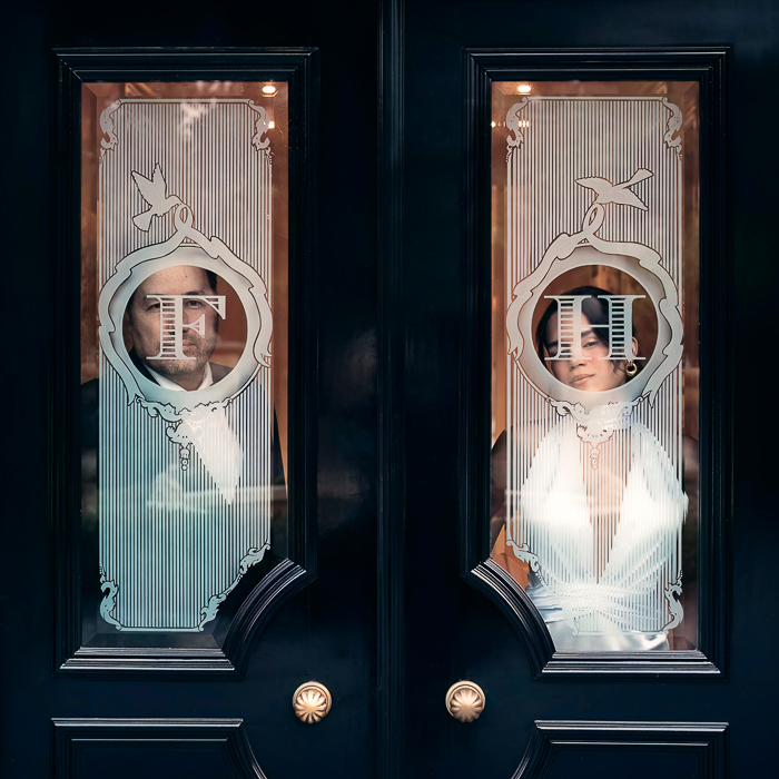 wedding portrait through a window