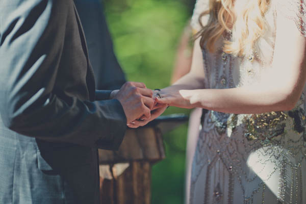 romantic camp wedding ceremony, photo by Terra Lange Photography | via junebugweddings.com ceremony portrait, putting on the rings