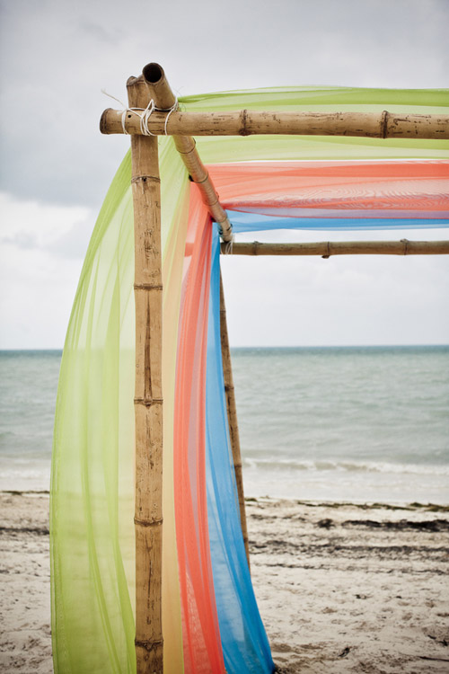 colorful tropical beach wedding at Excellence Playa Mujeres All-Inclusive Resort in Cancun, Mexico - photos by JAGstudios | via junebugweddings.com colorful tropical beach wedding at Excellence Playa Mujeres All-Inclusive Resort in Cancun, Mexico - photos by JAGstudios | via junebugweddings.com
