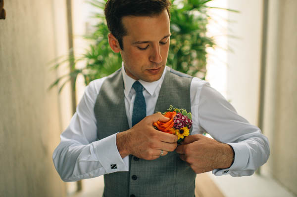 groom's vibrant boutonniere groom's vibrant boutonniere