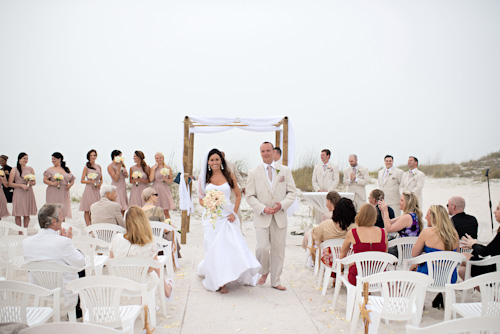 Clearwater, Florida beach wedding with a white, sand and pink wedding color palette, photo by Kristen Weaver | junebugweddings.com Clearwater, Florida beach wedding with a white, sand and pink wedding color palette, photo by Kristen Weaver | junebugweddings.com