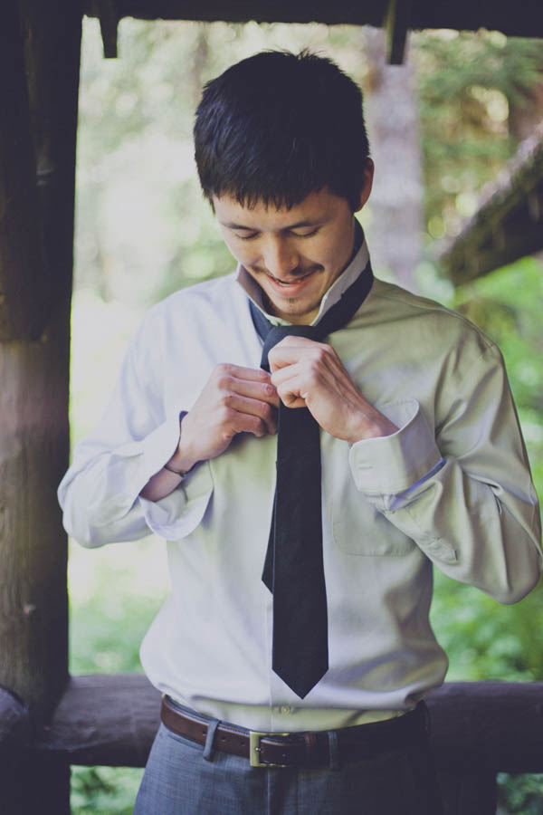 romantic camp wedding groom's portrait, photo by Terra Lange Photography | via junebugweddings.com groom getting ready portrait