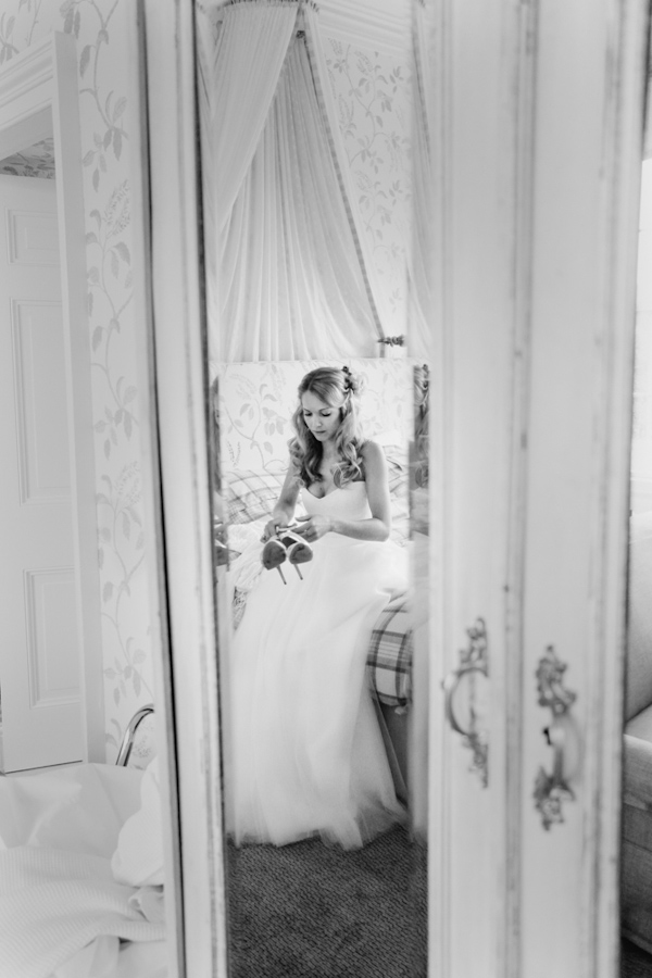 bride getting dressed, photo by Sansom Photography | via junebugweddings.com bride getting dressed, photo by Sansom Photography | via junebugweddings.com