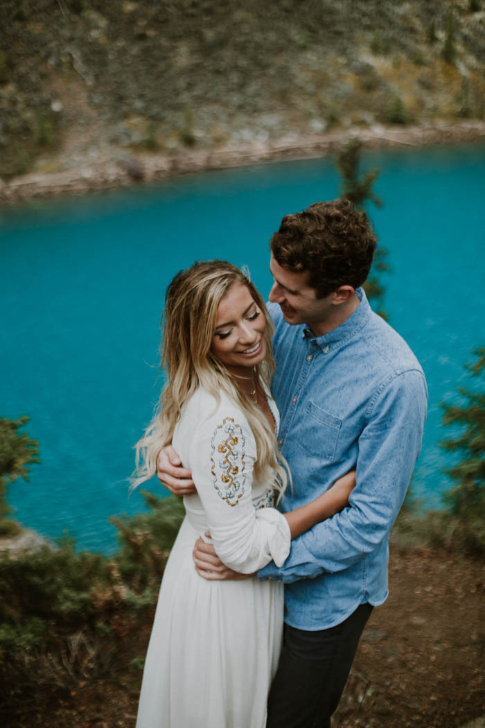 a-sudden-storm-only-made-this-lake-louise-engagement-more-stunning-nathan-walker-photography-12