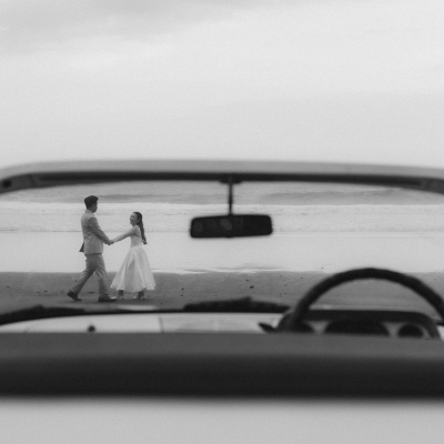 Vintage car beach elopement photo in Bali, Indonesia
