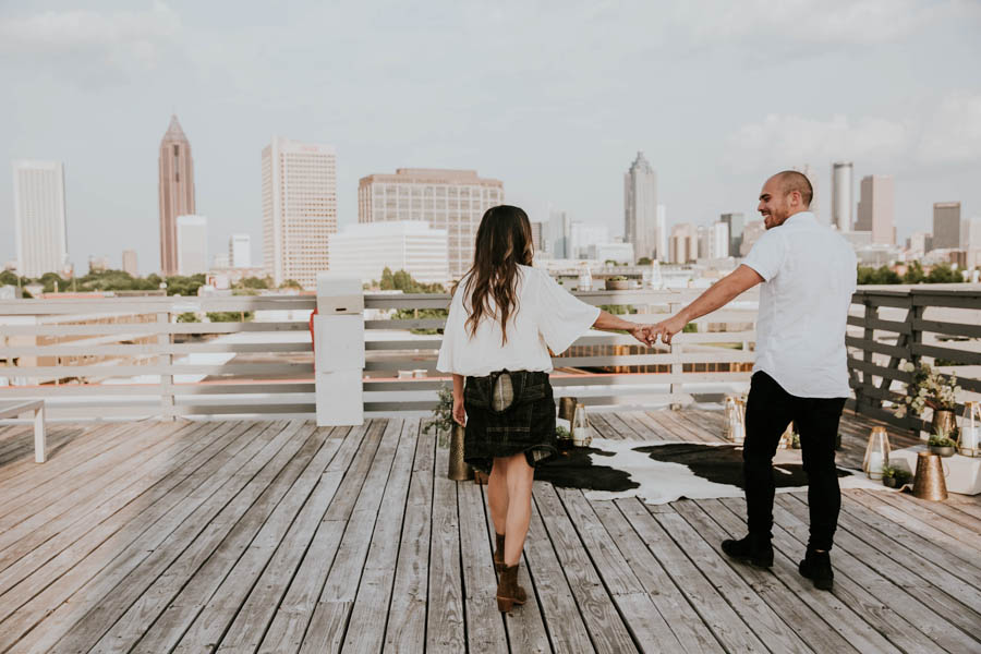 modern-rooftop-proposal-overlooking-the-atlanta-skyline-16