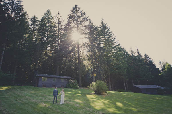 romantic camp wedding couple's portrait, photo by Terra Lange Photography | via junebugweddings.com couple's portrait with forest landscape