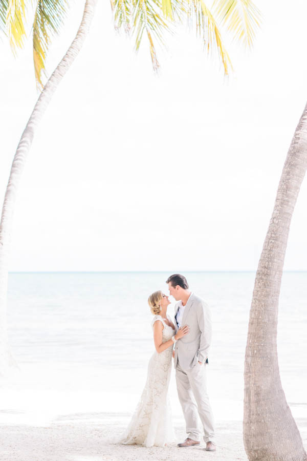 intimate beach wedding first look, photo by Chris Glenn | via junebugweddings.com intimate beach wedding first look, photo by Chris Glenn | via junebugweddings.com