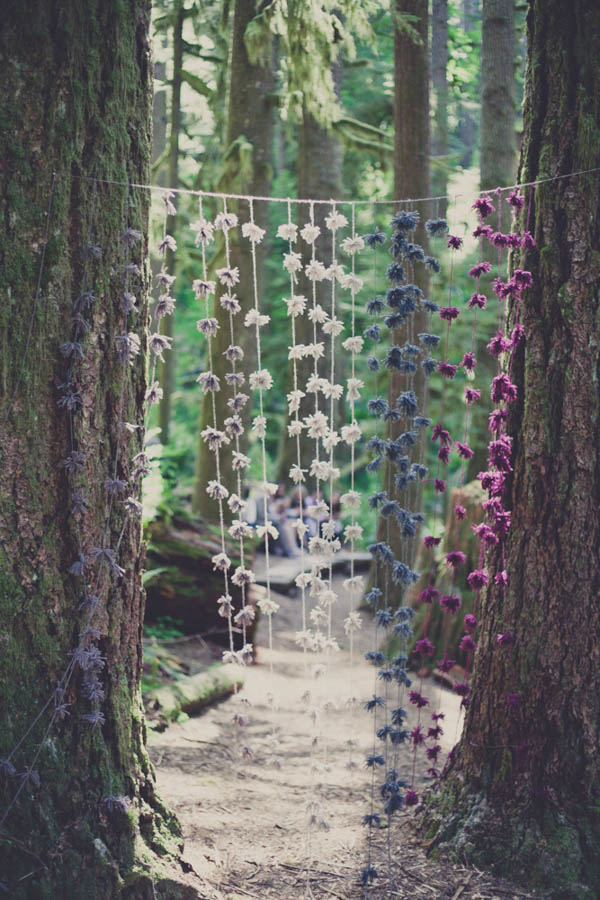 romantic camp wedding ceremony decor, photo by Terra Lange Photography | via junebugweddings.com romantic camp wedding ceremony hanging floral decor