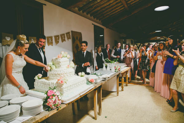 couple cutting the cake couple cutting the cake
