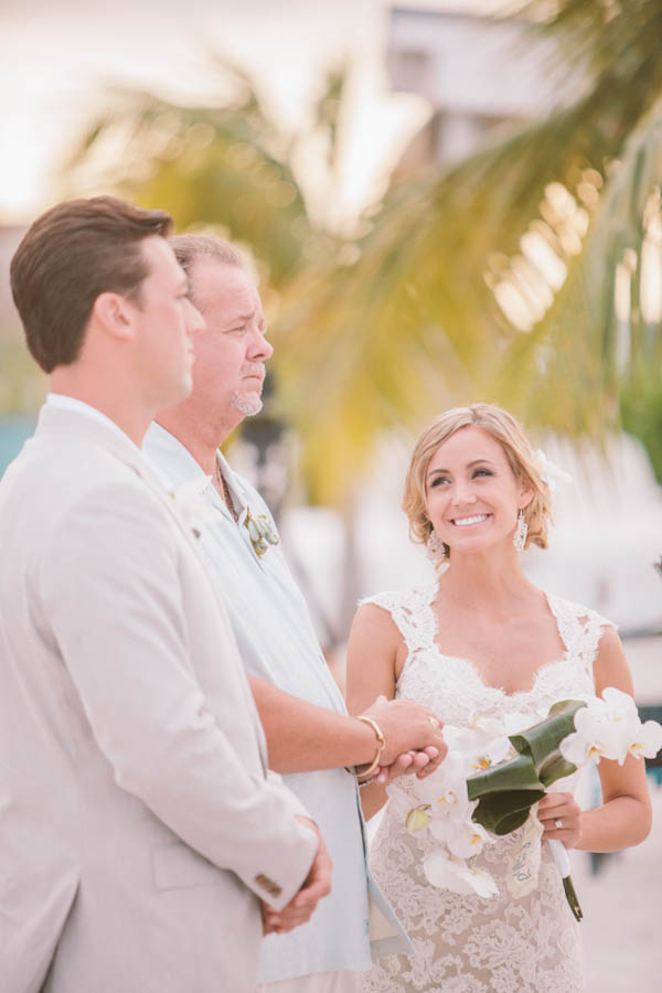 intimate beach wedding ceremony, photo by Chris Glenn | via junebugweddings.com intimate beach wedding ceremony, photo by Chris Glenn | via junebugweddings.com