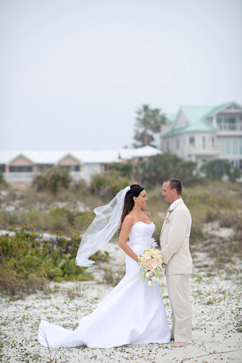 Clearwater, Florida beach wedding with a white, sand and pink wedding color palette, photo by Kristen Weaver | junebugweddings.com Clearwater, Florida beach wedding with a white, sand and pink wedding color palette, photo by Kristen Weaver | junebugweddings.com