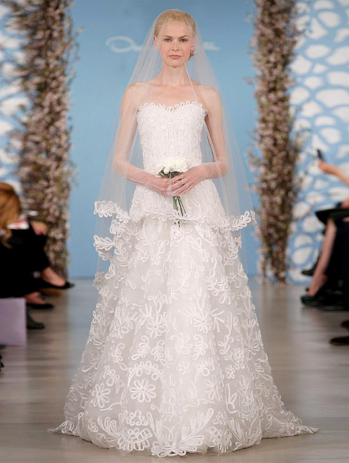 Wedding dress by Oscar de la Renta from his Spring 2014 bridal collection | via junebugweddings.com Wedding dress by Oscar de la Renta from his Spring 2014 bridal collection | via junebugweddings.com