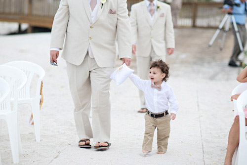 Clearwater, Florida beach wedding with a white, sand and pink wedding color palette, photo by Kristen Weaver | junebugweddings.com Clearwater, Florida beach wedding with a white, sand and pink wedding color palette, photo by Kristen Weaver | junebugweddings.com