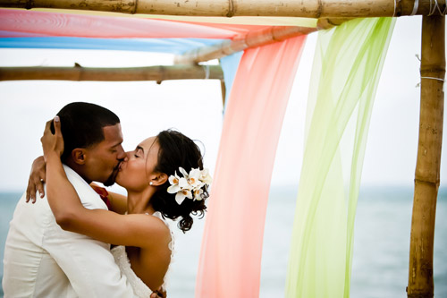 colorful tropical beach wedding at Excellence Playa Mujeres All-Inclusive Resort in Cancun, Mexico - photos by JAGstudios | via junebugweddings.com colorful tropical beach wedding at Excellence Playa Mujeres All-Inclusive Resort in Cancun, Mexico - photos by JAGstudios | via junebugweddings.com
