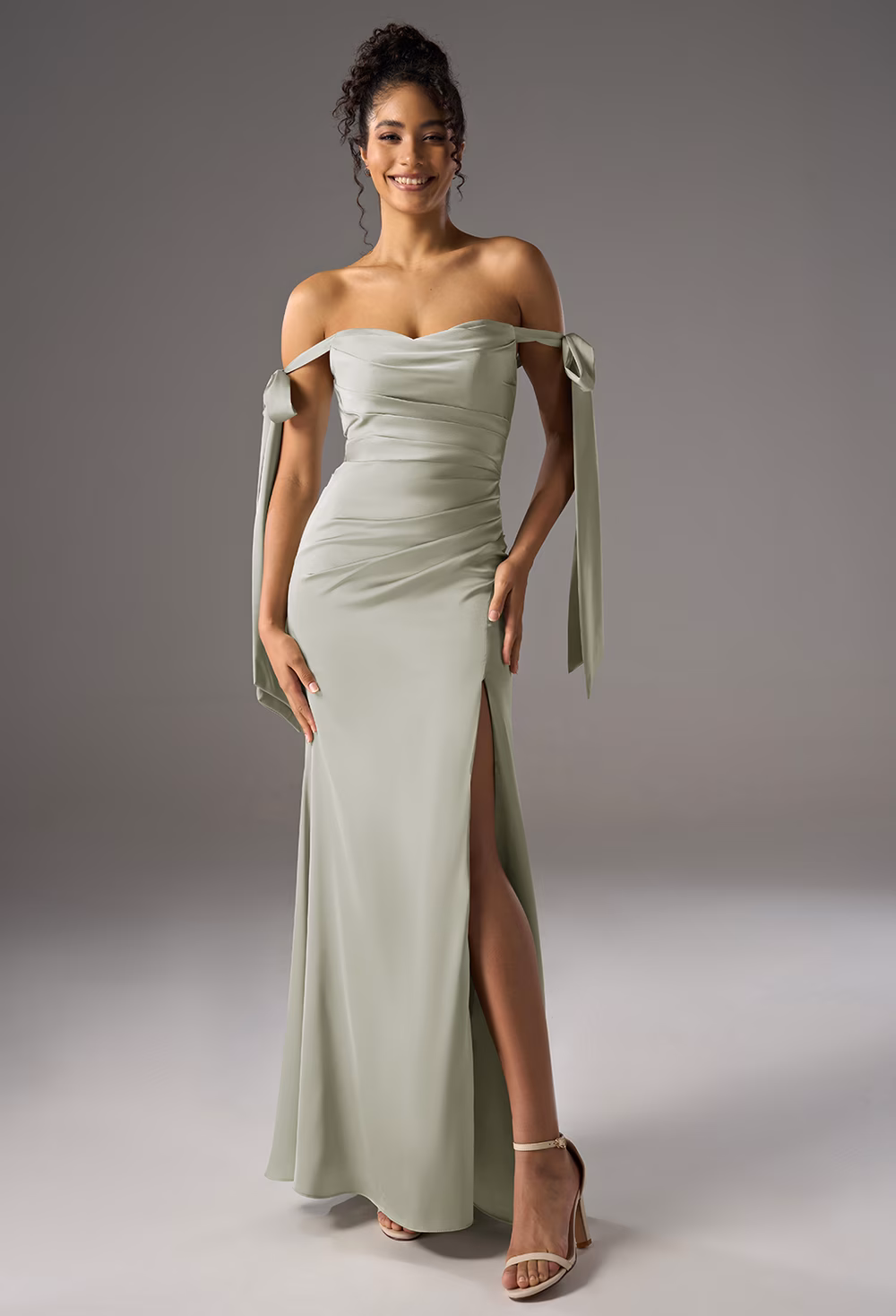long off-the-shoulder sage green bridesmaid dress