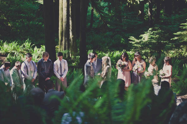 romantic camp wedding ceremony, photo by Terra Lange Photography | via junebugweddings.com gorgeous forest wedding ceremony landscape