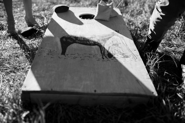 wedding cornhole game, photo by Chowen Photography | via junebugweddings.com wedding cornhole game, photo by Chowen Photography | via junebugweddings.com
