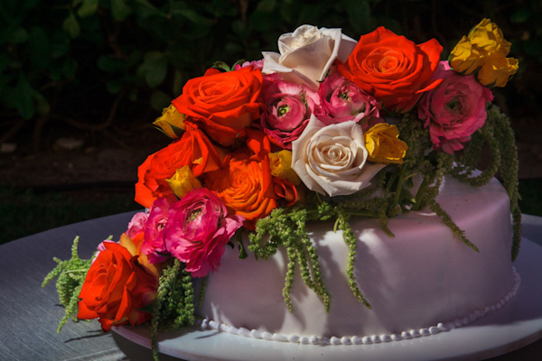 colorful floral wedding cake, photo by Zasil Studio | via junebugweddings.com colorful floral wedding cake, photo by Zasil Studio | via junebugweddings.com
