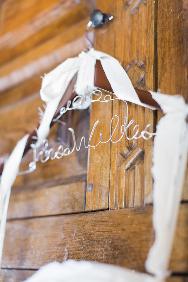 personalized wedding dress hanger, photo by Rachel Solomon | via junebugweddings.com personalized wedding dress hanger, photo by Rachel Solomon | via junebugweddings.com