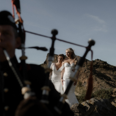 Scottish bagpipe engagement photo in the hills of Edinburgh, Scotland